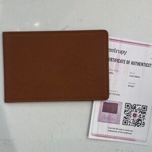 Louis Vuitton brown tiaga print leather ID holder